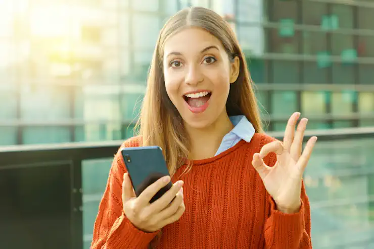 Woman Happy with Mobile Phone Shopping